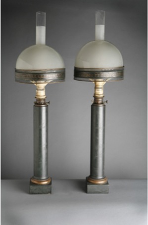 A Pair of Empire Bronzed and Gilt-Decorated Tole Columnar Oil Lamps (Lampes Carcel) from the Doris Duke Collection